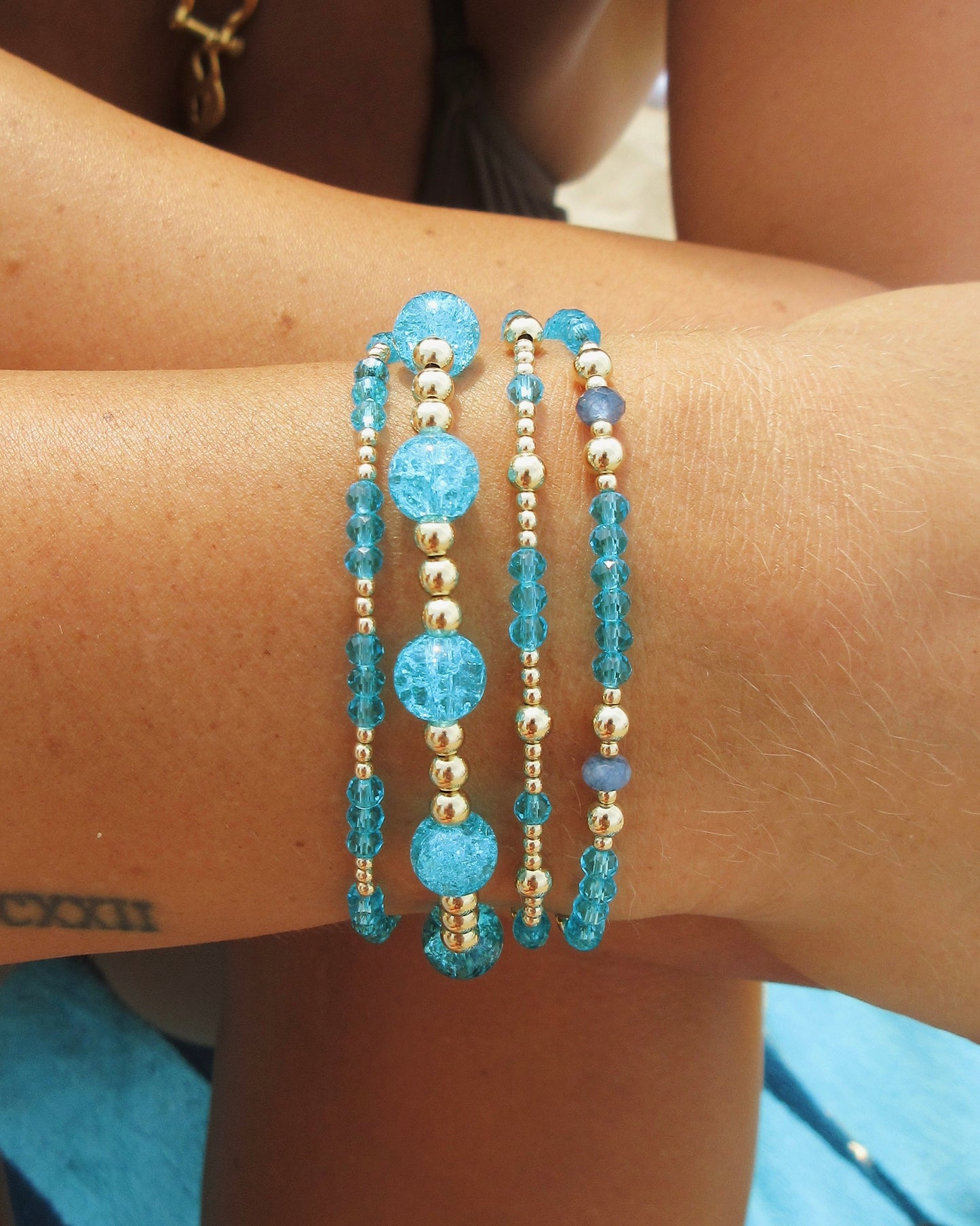 4mm Gold and 8mm Blue Beaded Bracelet