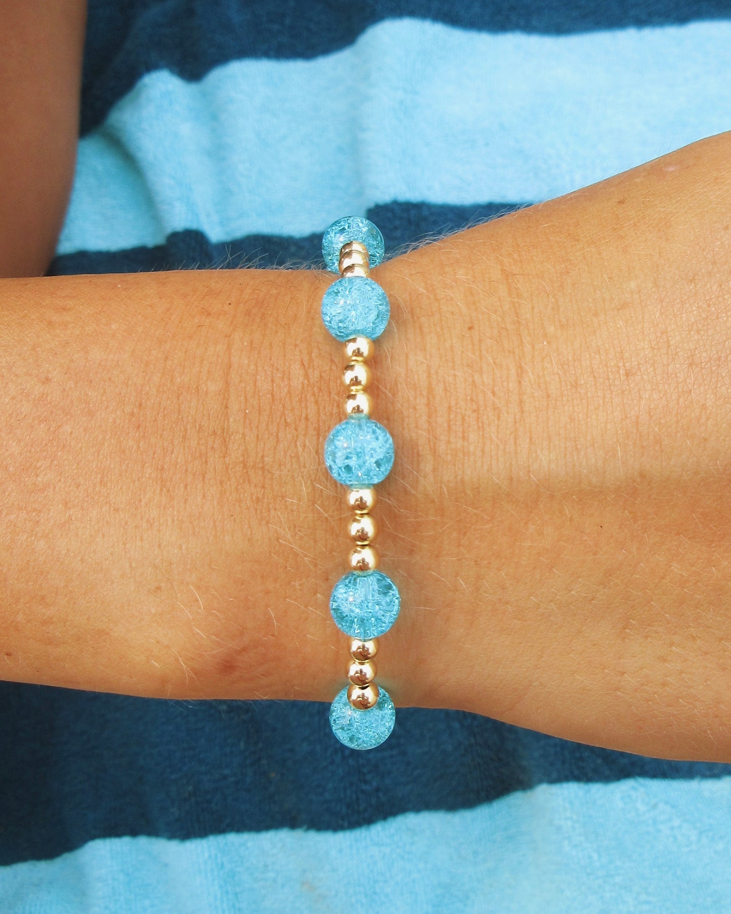 4mm Gold and 8mm Blue Beaded Bracelet